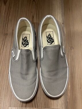 Vans Slip-On Canvas Sneakers in Gray and White
